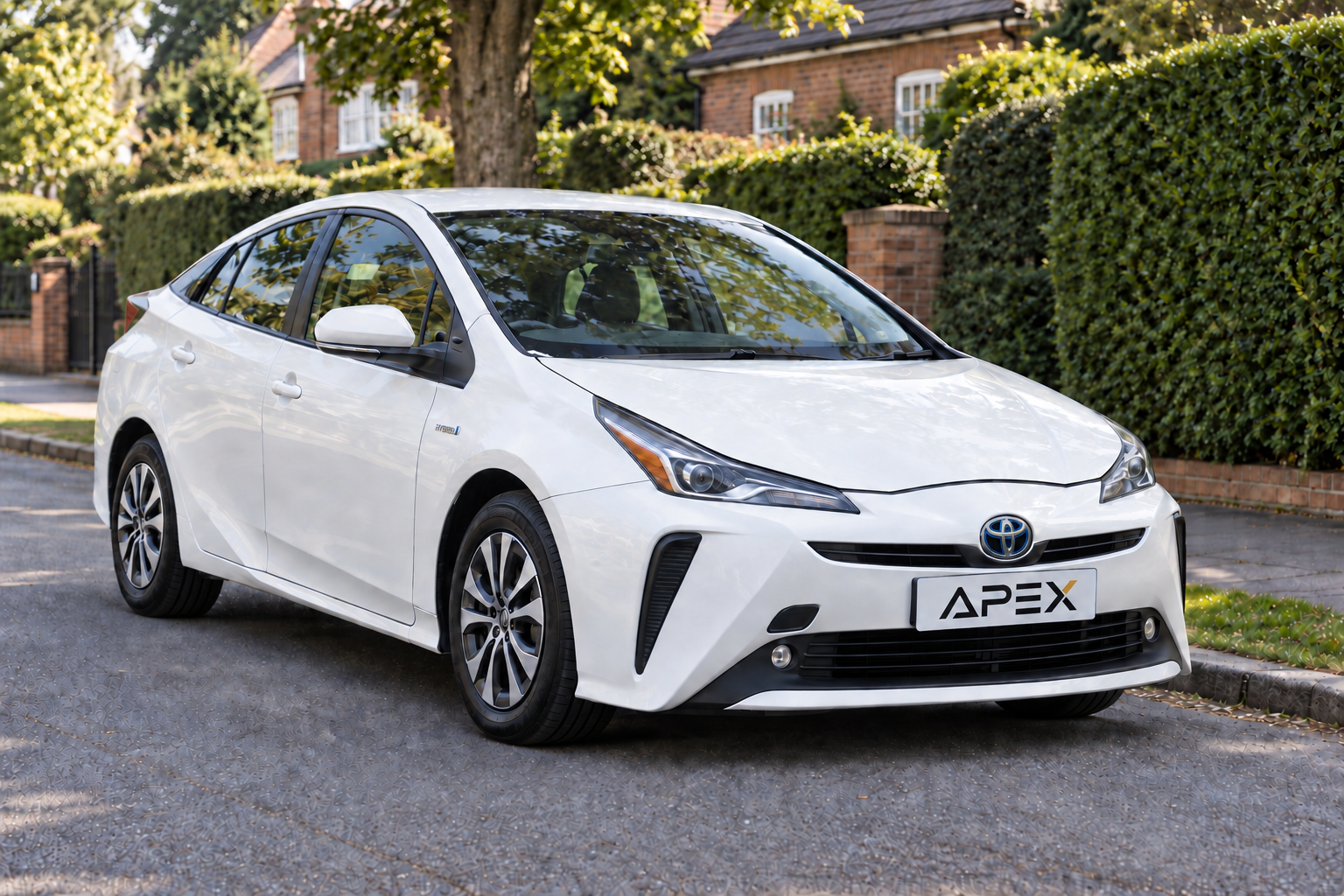 Illustrative white Toyota Prius