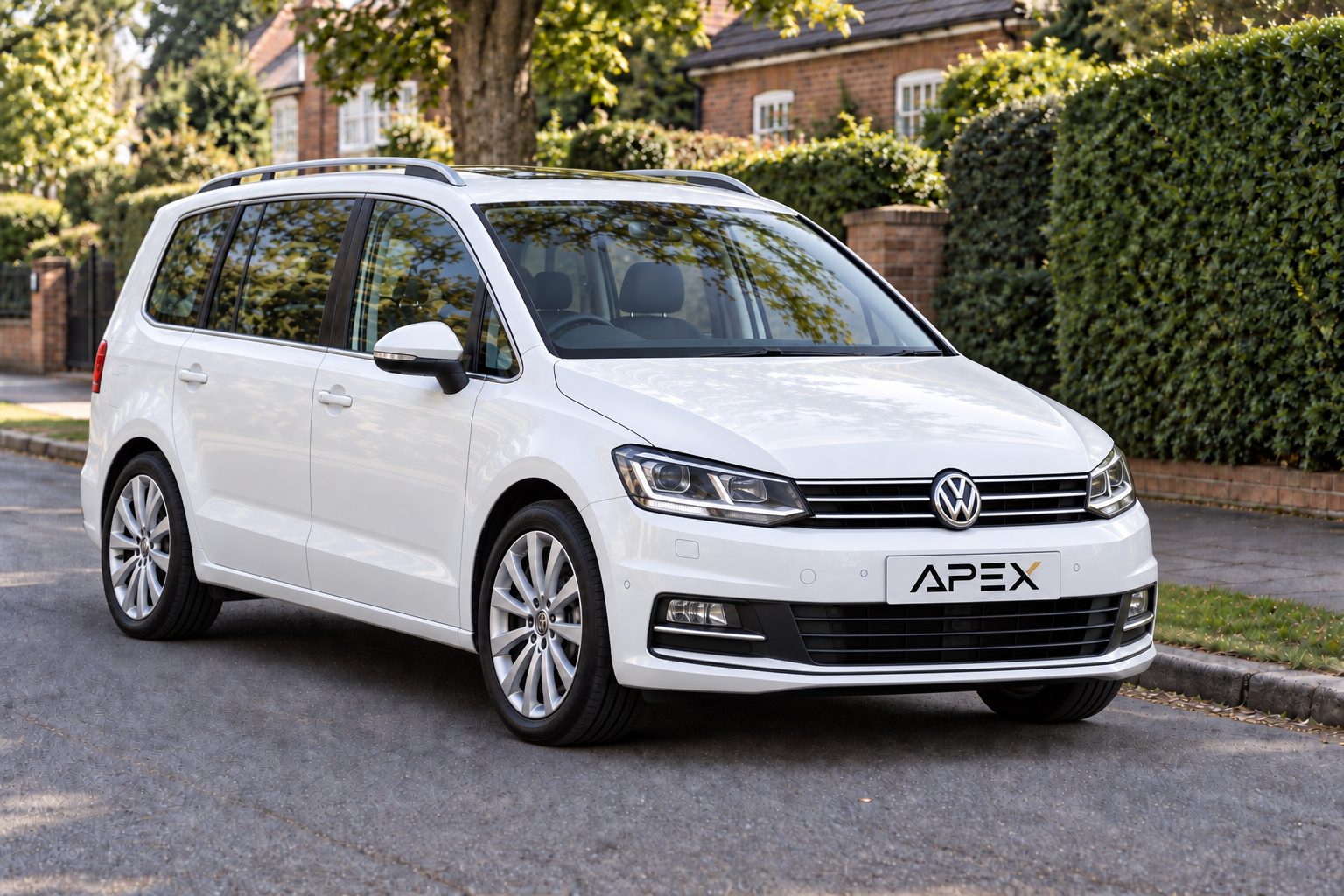 Illustrative white Volkswagen Touran